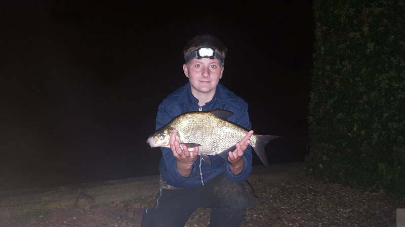 Liam night fishing for bream on the Norfolk Broads. Photo