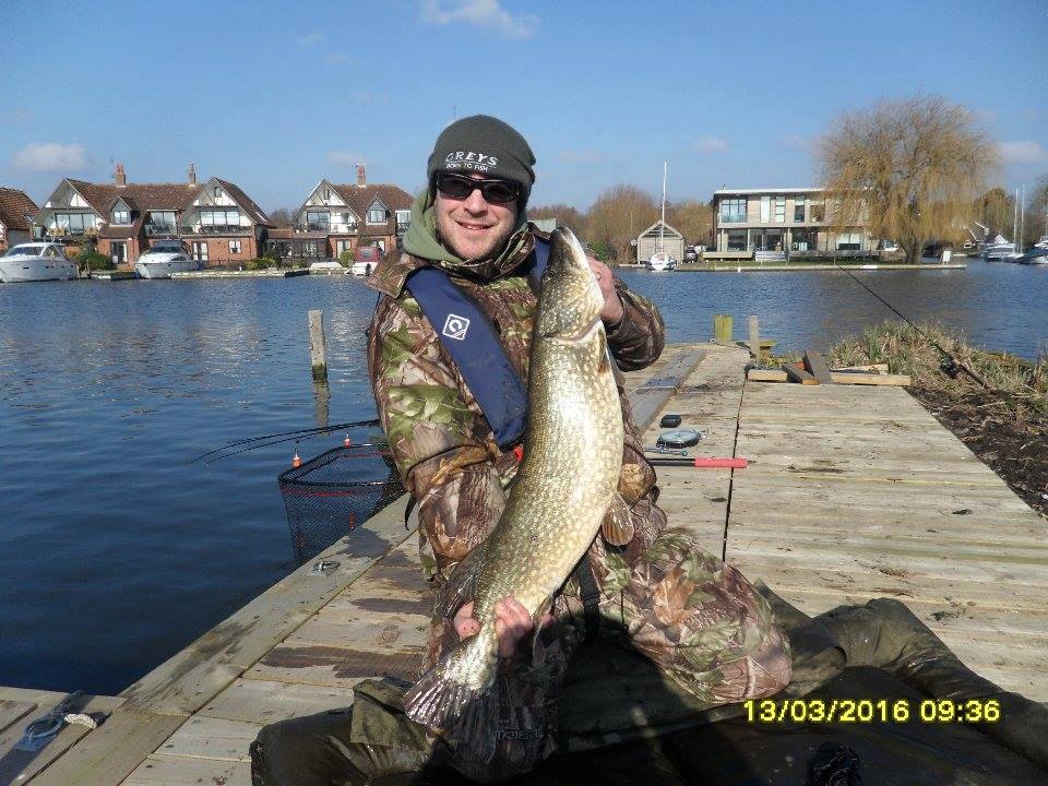 A hire boat customer showing a fine catch. Photo