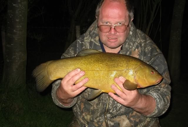 Andrew Burgess with a 8lb Kent syndicate tench. Photo