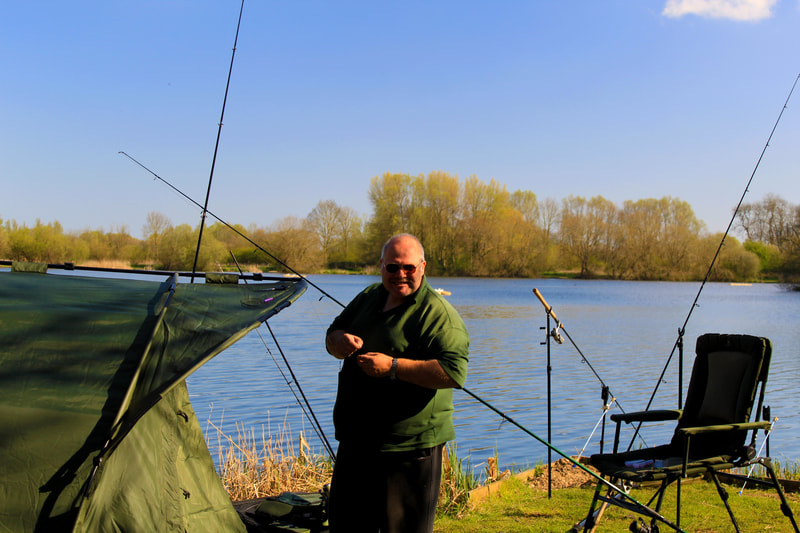 Andrew Burgess setting up to chase some monster Kent tench. Photo